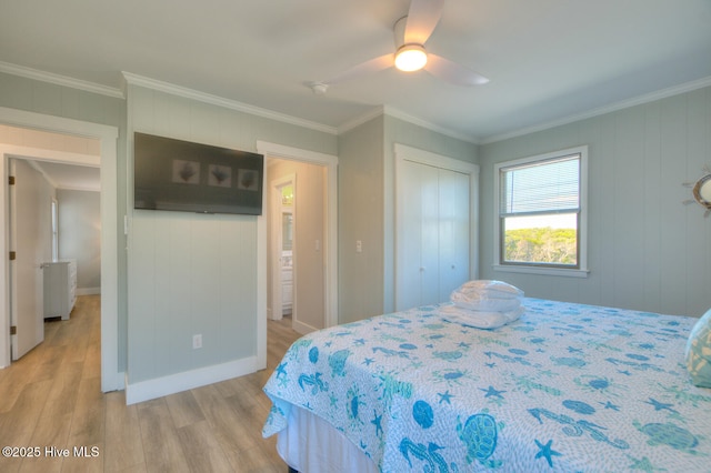 bedroom featuring ornamental molding, radiator heating unit, a closet, ceiling fan, and light hardwood / wood-style floors