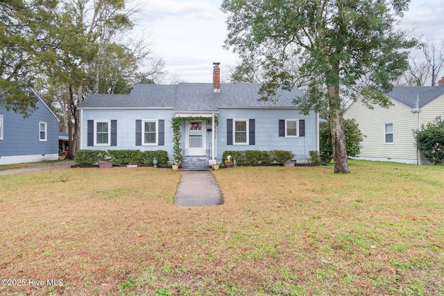 view of front facade with a front lawn