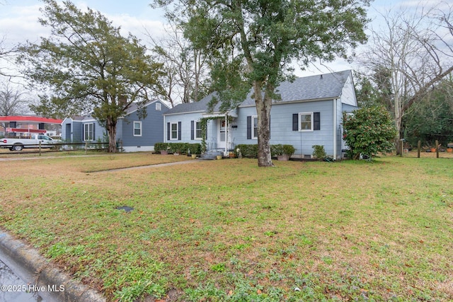 view of front of property with a front lawn