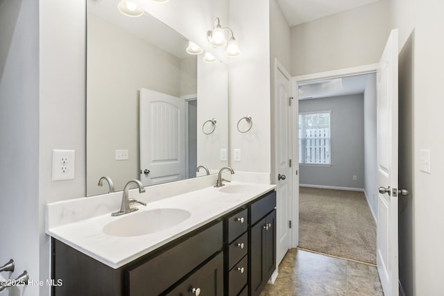 1180 Red Bay Pl, Leland, NC 28451 - full bathroom featuring double vanity, baseboards, and a sink