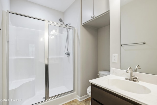 1180 Red Bay Pl, Leland, NC 28451 - bathroom featuring toilet, baseboards, a shower stall, and vanity