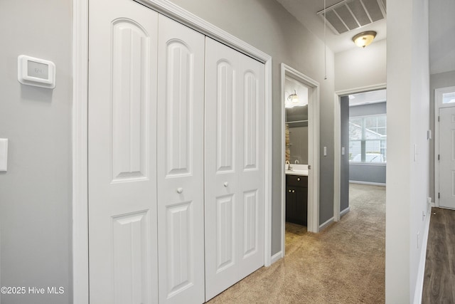 1180 Red Bay Pl, Leland, NC 28451 - corridor with a sink, carpet floors, baseboards, and visible vents