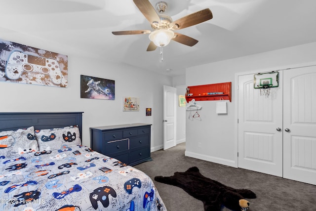 carpeted bedroom featuring a closet and ceiling fan