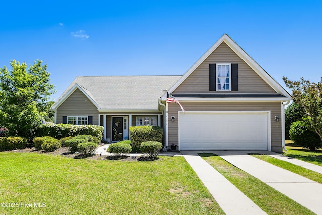 view of front facade featuring a front lawn and a garage