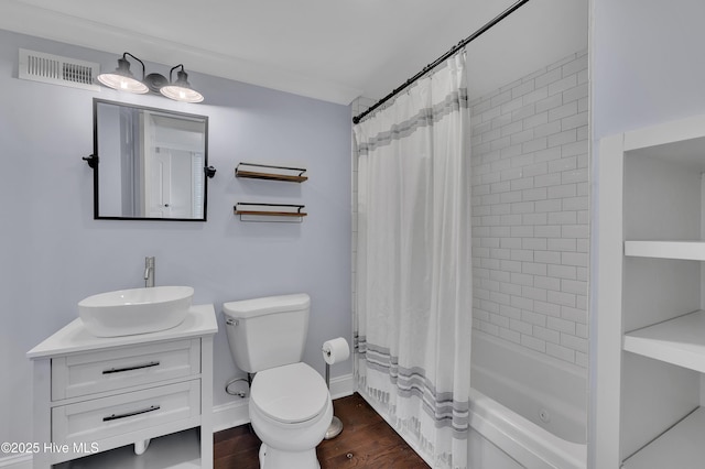 bathroom with visible vents, shower / bathtub combination with curtain, toilet, vanity, and wood finished floors