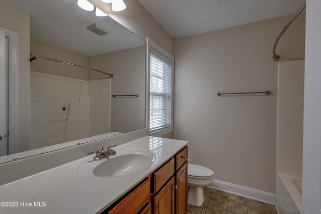 full bathroom with shower / bathtub combination, vanity, and toilet