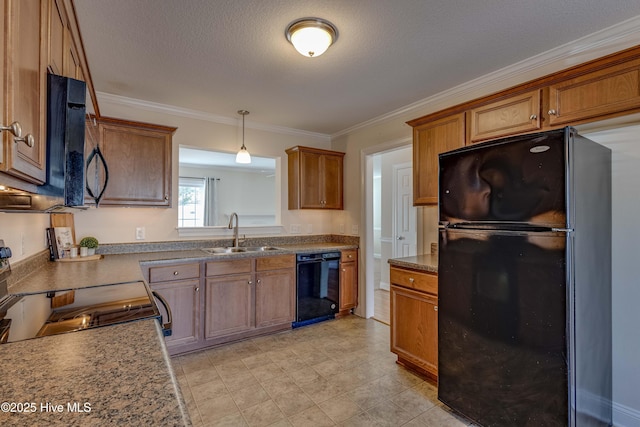 kitchen with pendant lighting, sink, black appliances, crown molding, and a textured ceiling