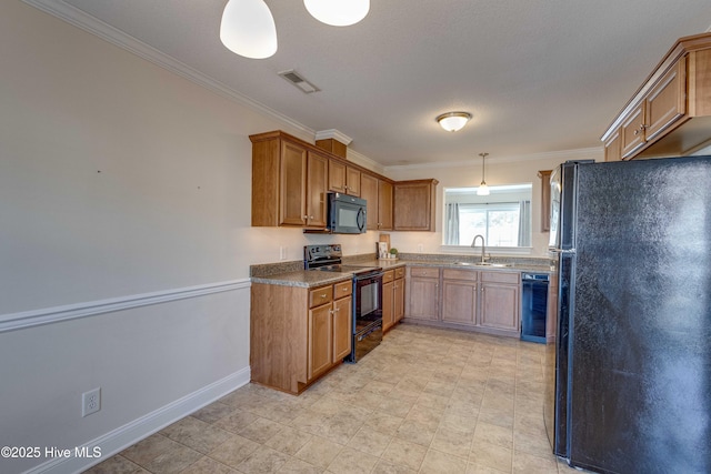 kitchen featuring ornamental molding, decorative light fixtures, sink, and black appliances