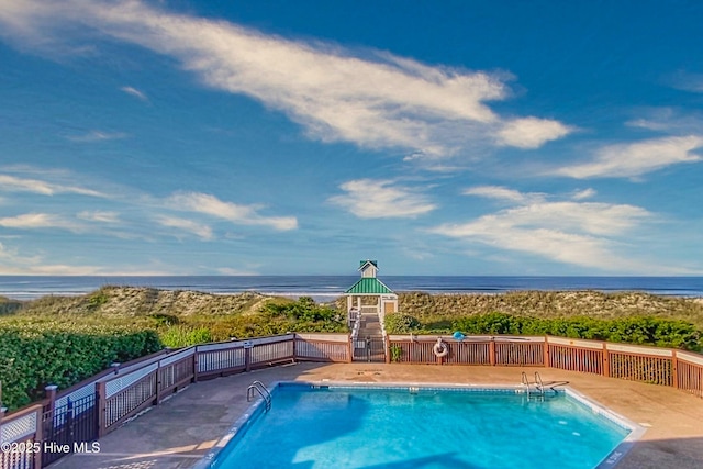 3566 Sanderling Dr SE, Southport, NC 28461 - view of swimming pool featuring a water view