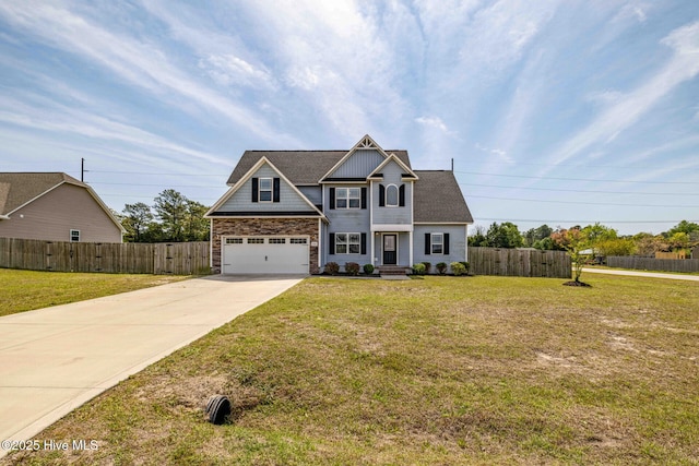 craftsman-style house with a garage, driveway, a front yard, and fence