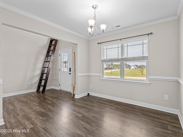 unfurnished dining area with wood finished floors, visible vents, ornamental molding, and a notable chandelier