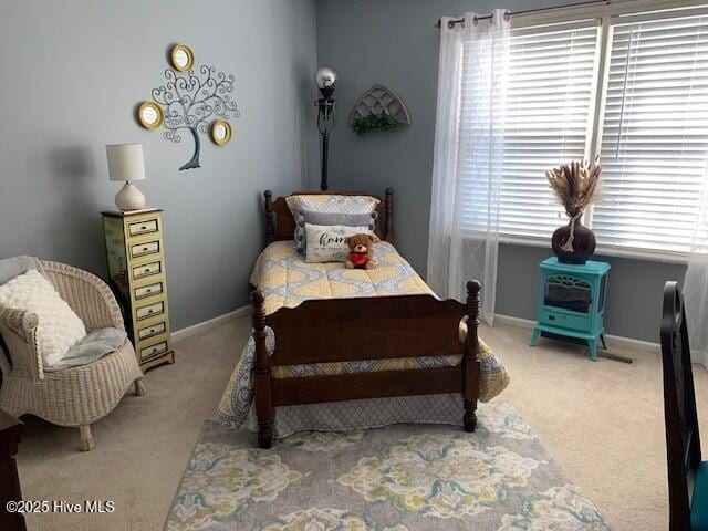 bedroom featuring carpet flooring