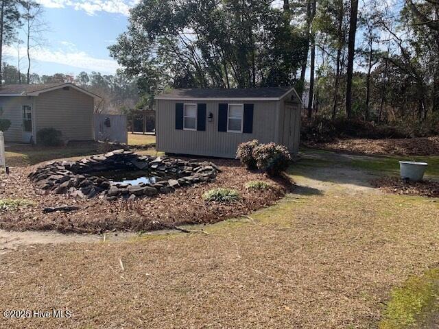 exterior space with a yard