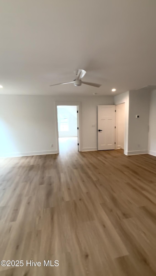 1643 Deerfield Dr SW, Ocean Isle Beach, NC 28469 - unfurnished room featuring ceiling fan, wood finished floors, and recessed lighting