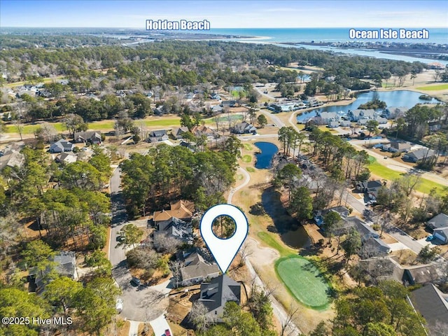 1643 Deerfield Dr SW, Ocean Isle Beach, NC 28469 - aerial view of property and surrounding area featuring a nearby body of water, nearby suburban area, and a golf course