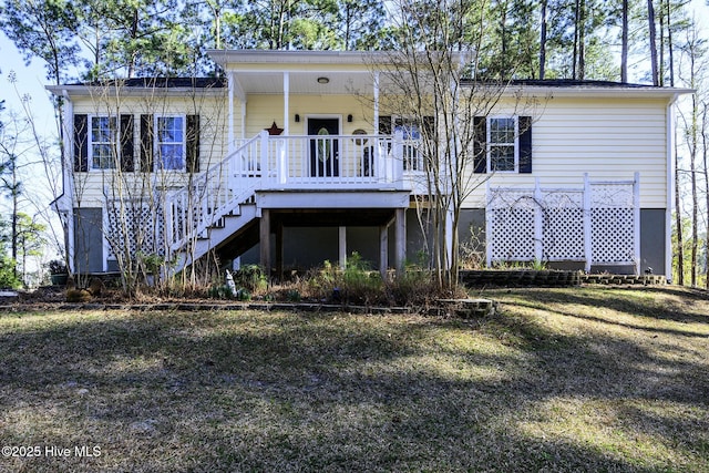 back of property featuring stairs