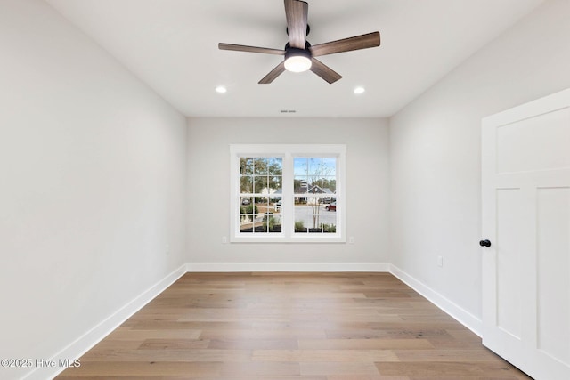 1773 Oakbrook Dr SW, Ocean Isle Beach, NC 28469 - empty room with ceiling fan, recessed lighting, light wood-style floors, and baseboards