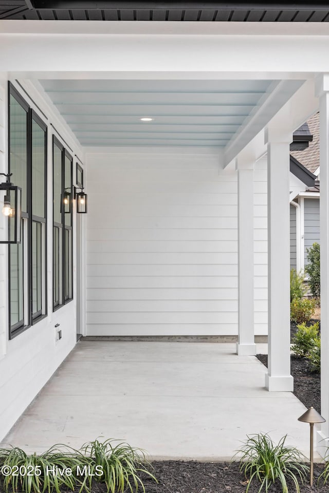 1773 Oakbrook Dr SW, Ocean Isle Beach, NC 28469 - view of patio with covered porch