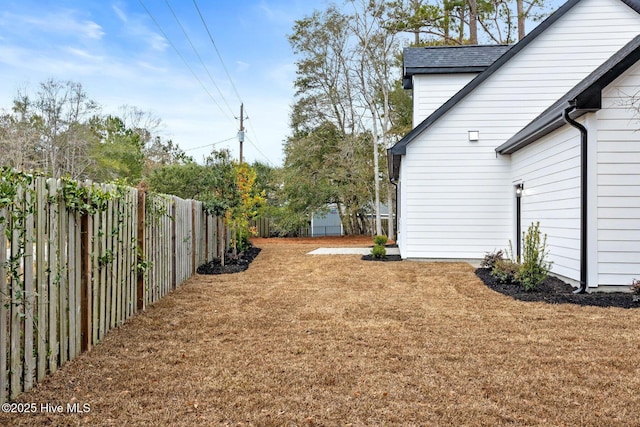 1773 Oakbrook Dr SW, Ocean Isle Beach, NC 28469 - view of yard featuring a fenced backyard