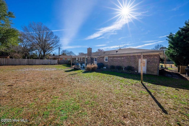 view of yard featuring fence