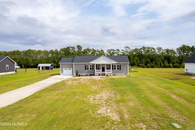 view of front facade with a porch, a garage, and a front yard