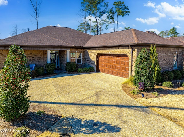 ranch-style house featuring a garage