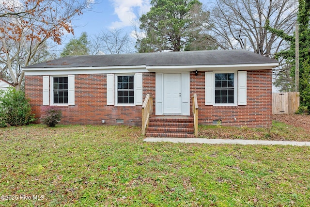 ranch-style house featuring a front lawn