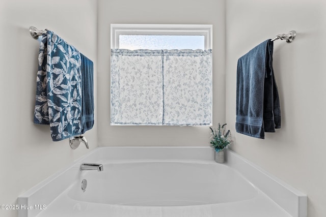 full bathroom with a bath