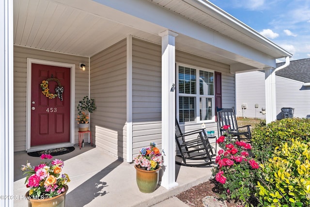 entrance to property with covered porch