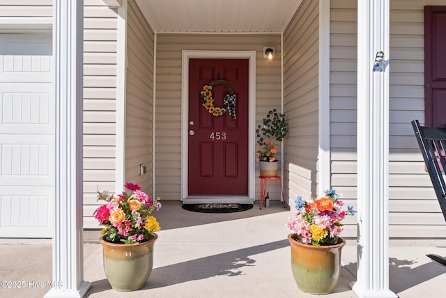 doorway to property featuring a porch