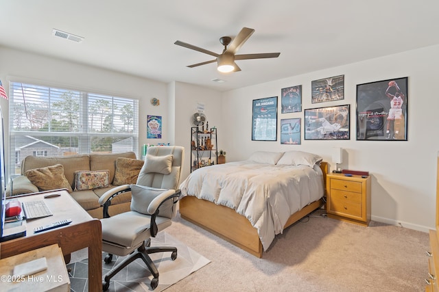 carpeted bedroom with ceiling fan