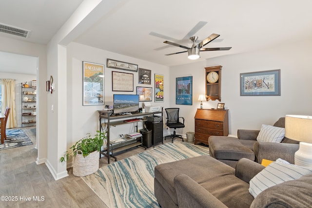 interior space with ceiling fan and light hardwood / wood-style floors