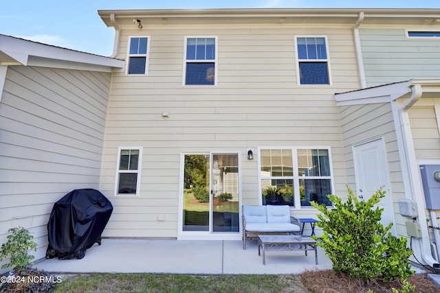 back of house featuring a patio area