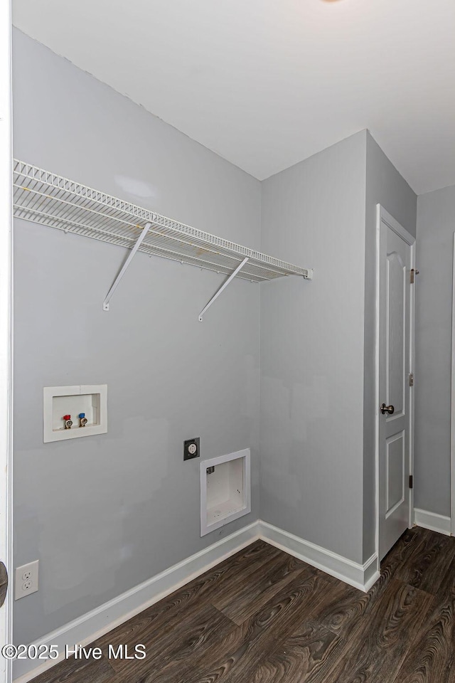 clothes washing area with washer hookup, dark hardwood / wood-style floors, and hookup for an electric dryer