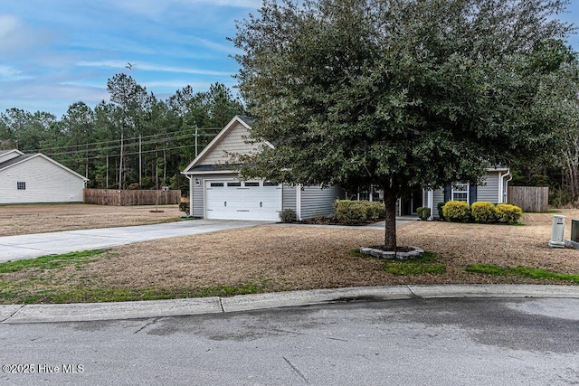 obstructed view of property featuring a garage