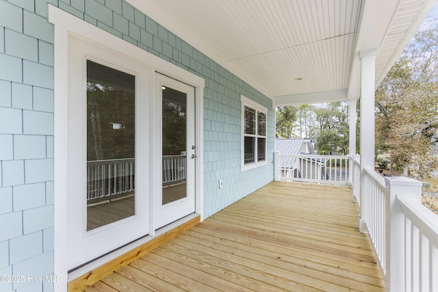 131 NW 18th St, Oak Island, NC 28465 - view of wooden porch
