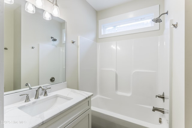 bathroom featuring vanity and bathtub / shower combination