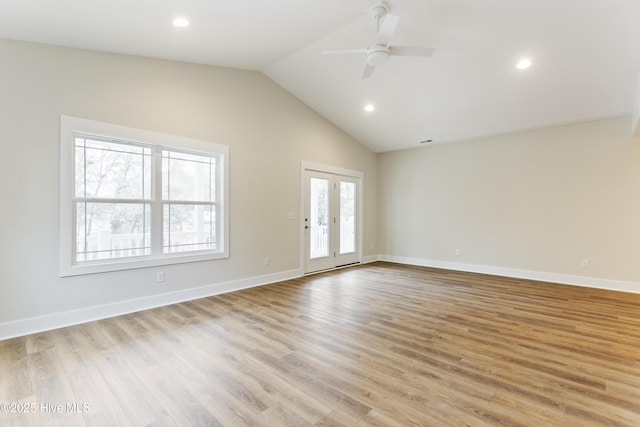 131 NW 18th St, Oak Island, NC 28465 - empty room featuring ceiling fan, vaulted ceiling, light wood-style floors, baseboards, and recessed lighting