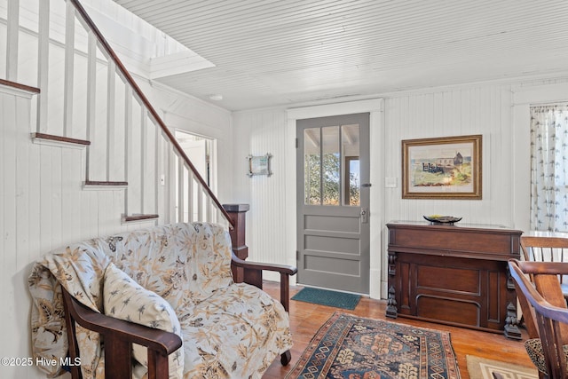 foyer with stairway and wood finished floors