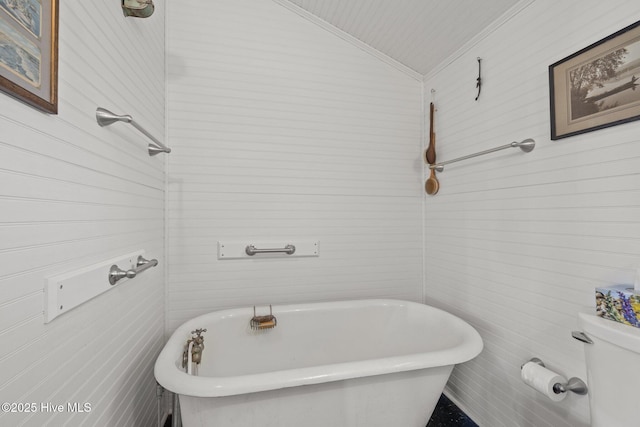 full bath featuring ornamental molding and a freestanding tub