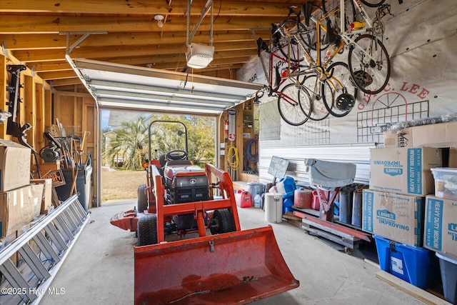 garage featuring a garage door opener