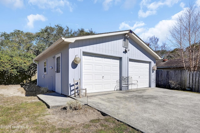 detached garage with fence