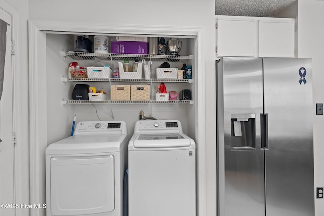 laundry area with washer and dryer