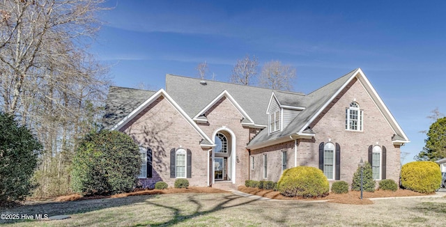 view of property with a front lawn