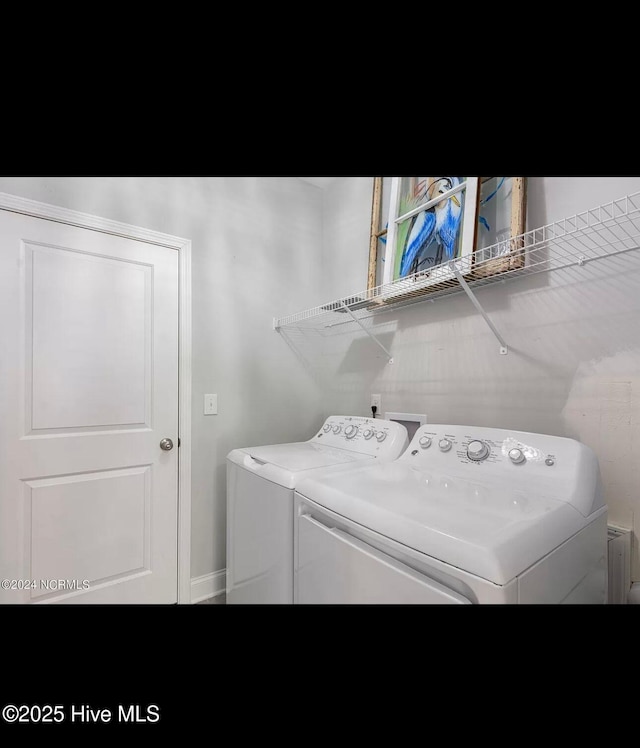 laundry room featuring independent washer and dryer