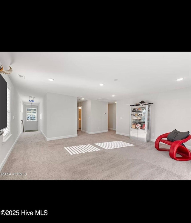 basement with light colored carpet