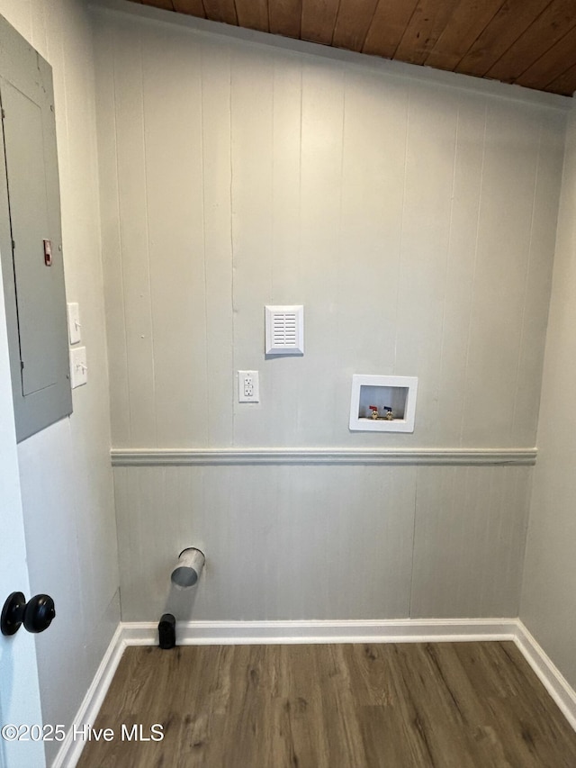 laundry room featuring hardwood / wood-style flooring, wooden ceiling, hookup for a washing machine, and electric panel