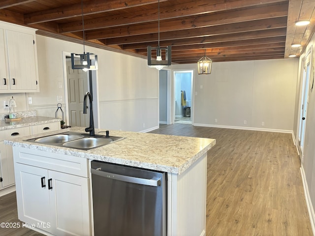 kitchen with decorative light fixtures, dishwasher, an island with sink, sink, and white cabinets