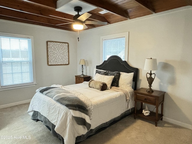 bedroom with light carpet, wood ceiling, beam ceiling, and ceiling fan