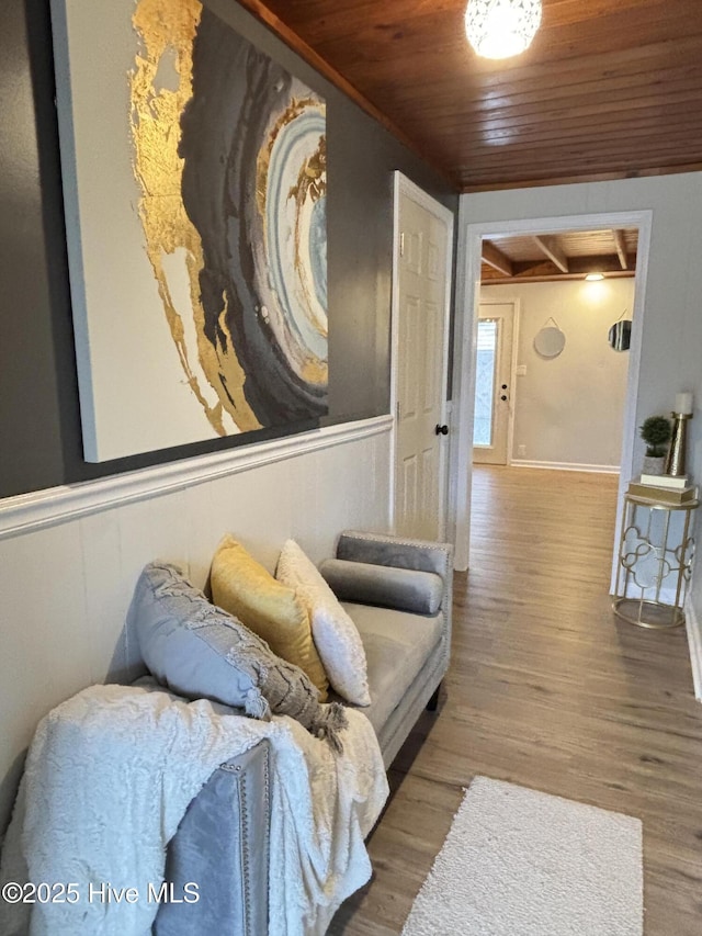 living room with hardwood / wood-style floors and wooden ceiling